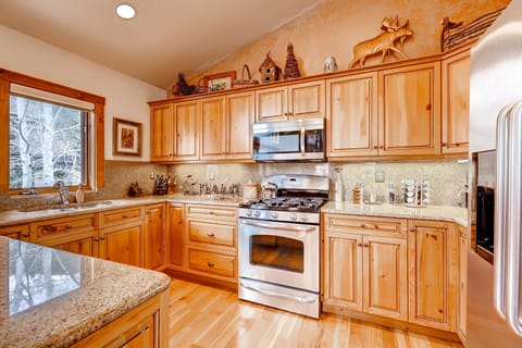 Prepare meals in the full kitchen.