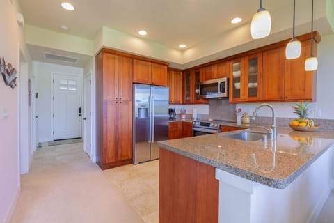 Kitchen with view of entry way