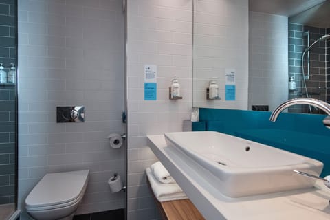 Shower, eco-friendly toiletries, hair dryer, towels