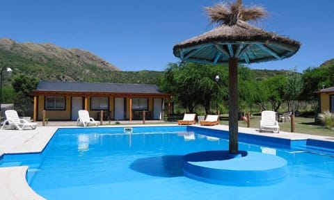 Seasonal outdoor pool, open 10 AM to 8 PM, sun loungers