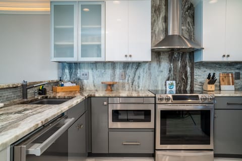 Spacious kitchen with stainless appliances and Italian Porcelain