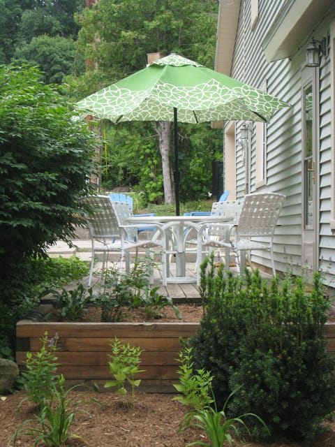 Lovely sitting area on a quiet street with BBQ grill for outdoor dining