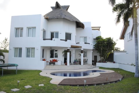 View of the house from the garden and beach