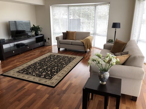 Lounge with comfortable seating,  large Smart TV & Ultra-Fast Internet