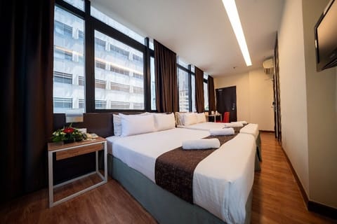 Family Quadruple Room | In-room safe, individually decorated, individually furnished, desk
