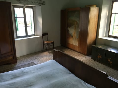 Room 1, ground floor, with painted amoire and view of Tolè