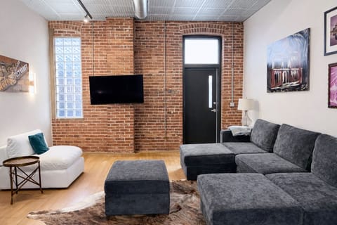 Spacious living room with sleeper sofa.