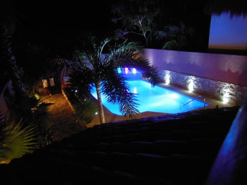Night view of pool from Master bedroom balcony