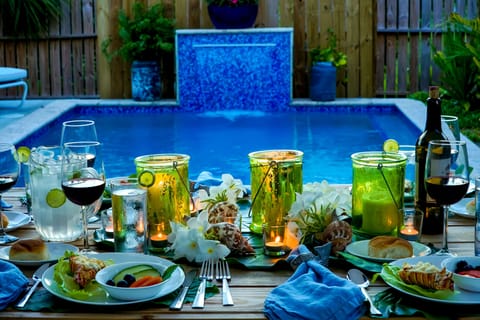 Poolside dining at Sanctuary Cottage