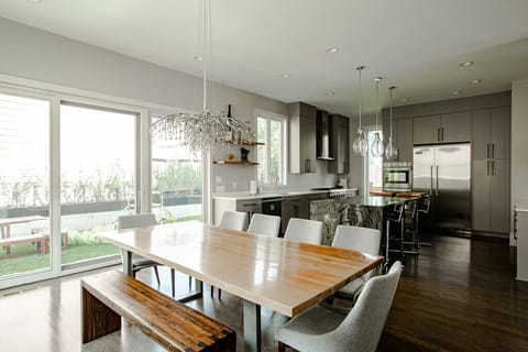 Large live edge dining table that includes seating for up to 9