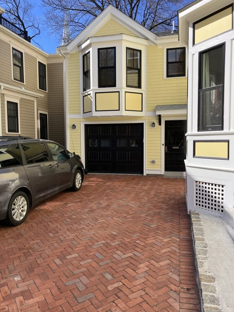 Keyless entry door to the right of garage. Off-street parking for 1 or 2 cars.