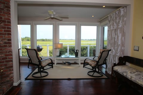 In addition to the living room, there is another sitting area off of dining room