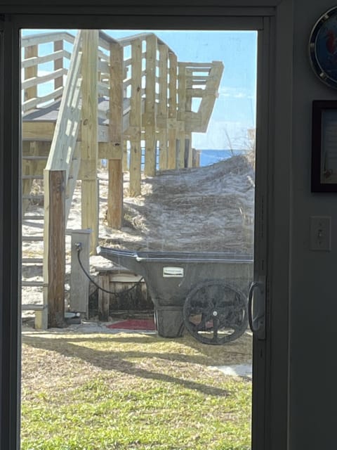 View from living room window. A glimpse of the Gulf. 2024