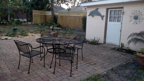 Laundry shed, patio furniture for outdoor cocktails and dining