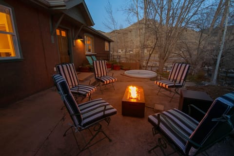 Private & peaceful courtyard with a gas fire pit, hot tub overlooking the Arkansas River. 