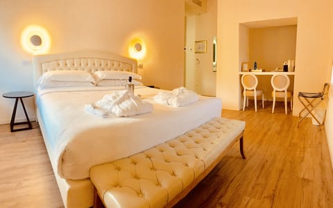 Junior Suite, City View | Minibar, in-room safe, desk, soundproofing