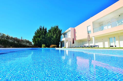 Outdoor pool, open 9:00 AM to 7:00 PM, sun loungers