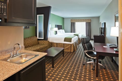 Down comforters, pillowtop beds, in-room safe, desk