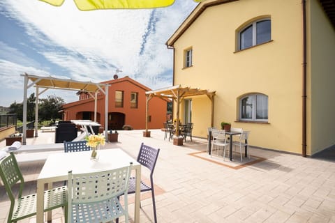Sky, Cloud, Property, Table, Window, Furniture, Building, Flowerpot, Chair, Lighting