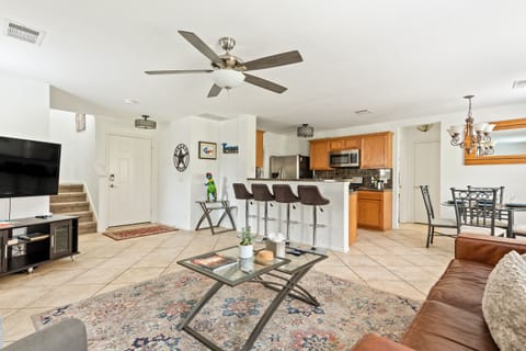 Living room, bar and kitchen