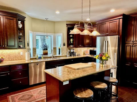 Chef's Kitchen with new dishwasher and new refrigerator. 
