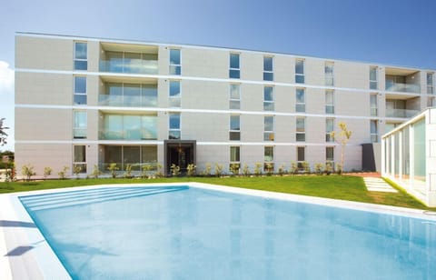Closed condo with pool, facing the beach and countryside. 
