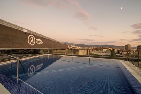 Outdoor pool, open 11:00 AM to 7:00 PM, pool umbrellas, sun loungers