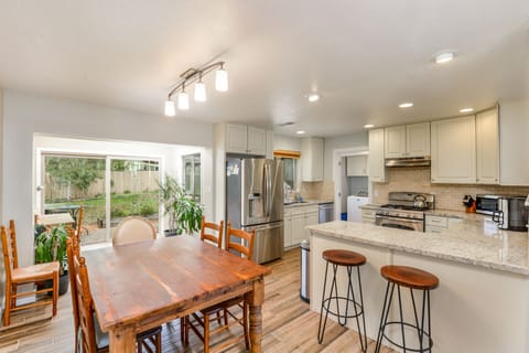 Kitchen dining room and sunroom.