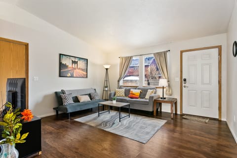 Spacious and relaxing living room with flat screen TV and preloaded streaming services. The vaulted ceilings open up the space!  And a sofa sleeper holds 2 more heads on pillows.