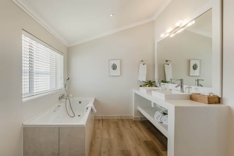 Luxury Suite, Balcony, Sea View | Bathroom | Separate tub and shower, free toiletries, hair dryer, bathrobes