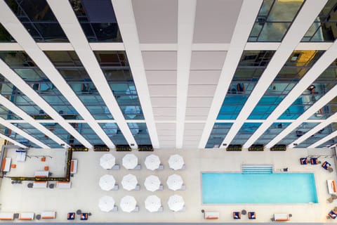 Outdoor pool, open 8:00 AM to 8:30 PM, pool umbrellas, sun loungers