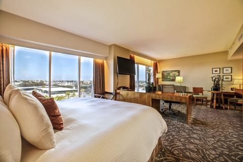 Premium bedding, down comforters, in-room safe, desk