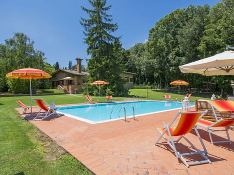 Sky, Building, Plant, Water, Tree, Swimming Pool, Chair, Shade, Outdoor Furniture, House