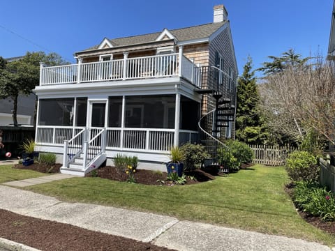 Main House with spiral staircase up to the second floor deck