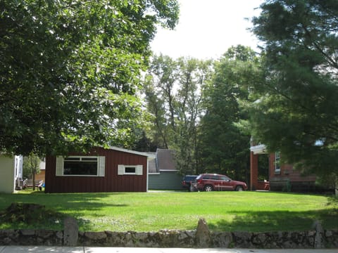 Side yard view from Garmon Ave. (One of two large lawns for games & outdoor fun)