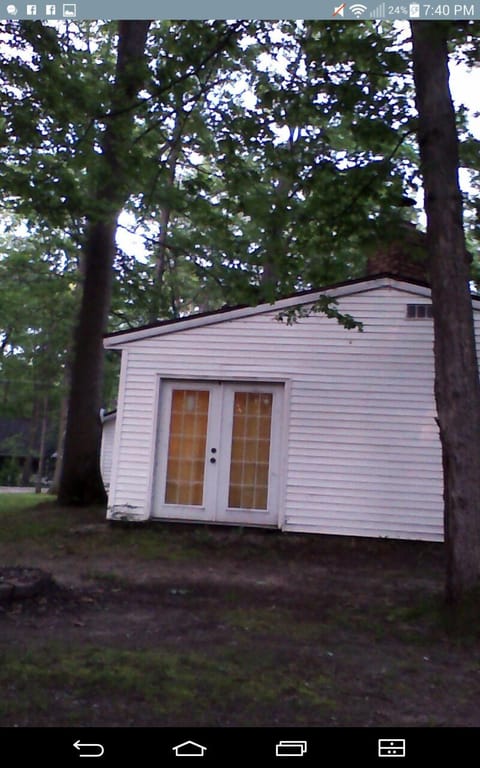 Back of house with firepit