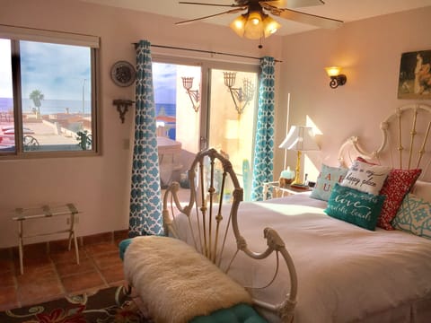Master bedroom with an ocean view 