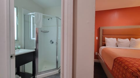 Premium Room, 2 Queen Beds | Bathroom | Combined shower/tub, free toiletries, hair dryer, towels