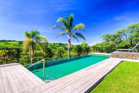Outdoor pool, open 6:00 AM to 9:00 PM, sun loungers