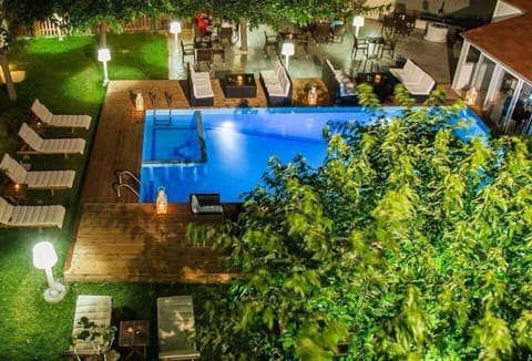 Outdoor pool, open 8:30 AM to 6 PM, pool umbrellas, sun loungers