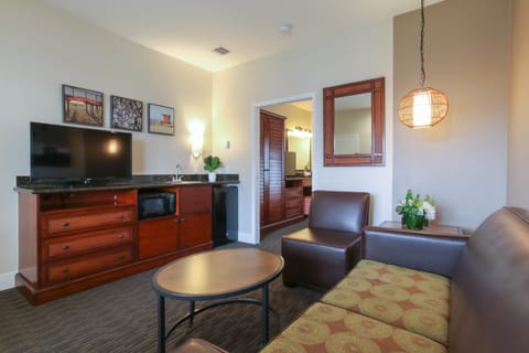 Top Floor Courtyard View King Suite Sleeper Sofa | Living area | Flat-screen TV