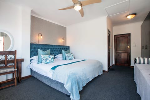 Deluxe Triple Room, 1 Bedroom, Ocean View | Premium bedding, in-room safe, soundproofing, iron/ironing board
