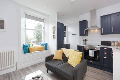 Superior Apartment, 1 Bedroom | Living area | 49-inch LED TV with premium channels, TV, Netflix