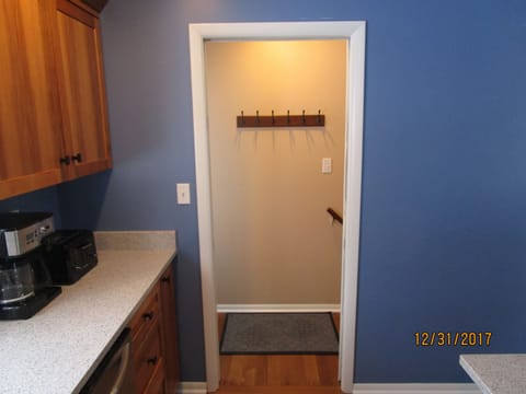 Additional coat rack off kitchen.
