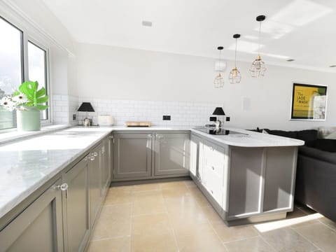 Cottage | Private kitchen | Fridge, microwave, stovetop, highchair