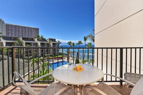 Relax on your private, fully furnished lanai with views of the resort pools and Pacific ocean