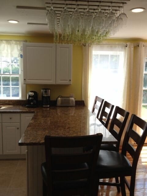 Breakfast bar seats 5-6, plus dining table seating 12-14, total seating for 20