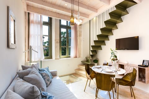 Deluxe Suite, Terrace | In-room safe, blackout drapes, iron/ironing board, free WiFi