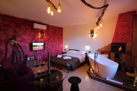 Suite, Bathtub | Minibar, individually furnished, blackout drapes, free WiFi