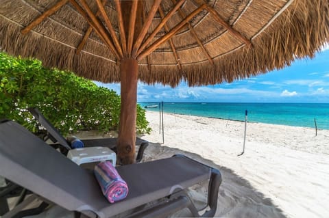 Shade palapa and loungers for guest use - Villa Serenity 3 bedroom Aventuras Akumal beach vacation rental